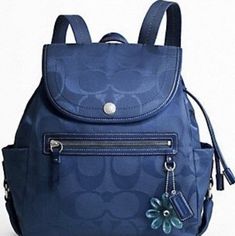 This Brand New Beautiful Navy Blue Coach Backpack Is Perfect For Everyday Use Or Travel. Signature Fabric-Nylon With Pvc Leather Trim. Magnetic Snap Flap And Drawstring Closure. Two Multipurpose Pockets And One Zippered Pocket. Adjustable Shoulder Straps For Your Own Comfort. Blue Backpack With Detachable Strap, Blue Functional Backpack, Blue Nylon Backpack For On-the-go, Coach Backpack With Detachable Strap For Travel, Blue Backpack With Removable Pouch, Coach Blue Travel Bag, Blue Coach Travel Bag, Coach Backpack, Denim Backpack