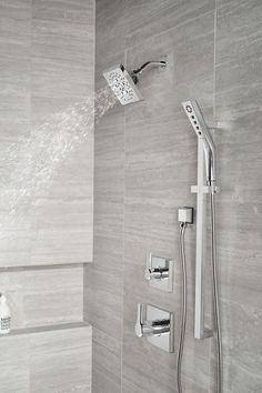 a shower head with thermostaer and hand held shower faucet