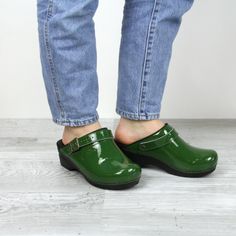 The Estelle features a patent leather upper in green, an adjustable and movable strap, a padded instep and a microfiber insole with an anatomically correct footbed. The polyurethane outsole features a rocker bottom. This style is APMA approved and part of our Professional collection. Dansko Professional Clog, Rocker, Patent Leather, Clogs, Leather Upper, My Style, Green, Leather