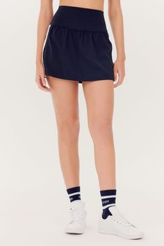 A lightweight easy to wear skort with contrast stripes in our ultra luxe, super soft Airweight fabric. Quick dry super powers, so you're safe working up a sweat. BEST FOR: Running, tennis, pickleball, court sports, spin class, cycling and gym workouts.Model Stats:Height: 5’9”, Bust: 32.”5, Waist: 23.5”, Hips: 35”Wearing size: Small Casual Tennis Skirt With Built-in Shorts For Training, Casual Tennis Activewear With Built-in Shorts, Sporty Tennis Activewear With Built-in Shorts, Tennis Activewear With Built-in Shorts, Sporty Navy Bottoms With Built-in Shorts, Athleisure Tennis Bottoms With Built-in Shorts, Sporty Spring Tennis Dress With Built-in Shorts, Sporty Tennis Dress With Built-in Shorts For Spring, Sporty Relaxed Fit Skort For Summer