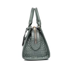 GlamGator Textured Handbag stands out with its unique alligator texture. Ideal for those who desire a blend of high fashion and exotic charm in their accessories. Handheld Leather Satchel With Crocodile Pattern, Handheld Crocodile Pattern Business Shoulder Bag, Handheld Leather Shoulder Bag With Crocodile Pattern, Luxury Crocodile Pattern Handheld Bag, Office Crocodile Pattern Crossbody Bag, Leather Satchel With Crocodile Pattern And Double Handle, Office Leather Bags With Crocodile Pattern, Business Crocodile Pattern Satchel Bag, Leather Satchel With Crocodile Pattern