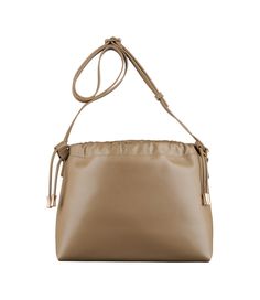 A.P.C. Women's bag.- Recycled leather-like material. - Magnetic inside closure. - Drawstring closure on top. - Shoulder strap to wear the bag on the shoulder or across the chest. - One interior pocket. - Goldtone 'A.P.C. rue Madame Paris' logo embossed on the front. - In the Ninon product line. Khaki Leather Shoulder Bag For On-the-go, Khaki Bucket Bag With Adjustable Strap, Chic Khaki Shoulder Bag With Removable Pouch, Beige Flap Bag With Adjustable Strap For On-the-go, Beige Leather Pouch Flap Bag, Khaki Top Handle Shoulder Bag For Travel, Modern Taupe Shoulder Bag With Detachable Strap, Versatile Leather Flap Bag With Adjustable Handle, Taupe Shoulder Bag For Travel