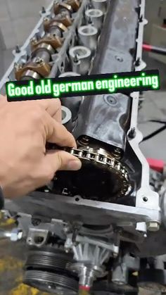 someone is working on an engine with the words good old german engineering