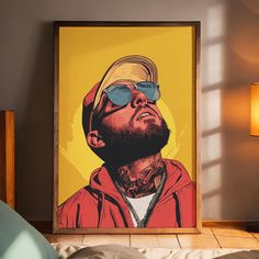 a painting of a man with sunglasses on his head is displayed in front of a bed