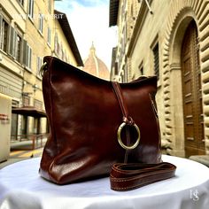 This bag has been made of the best genuine leather by local master crafters of Florence in Italy, designed for women who only accept premium Italian quality and luxury leather bags and modern Italian fashion. . . . Sizes: Width: 33cm / 13inches Height: 26cm/ 10.3 inches Depth: 12cm/ 4.8 inches The story of this bag: Once upon a time, in the heart of Florence, Italy, a skilled artisan embarked on a journey to create the epitome of elegance and sophistication: the Florence Leather Bag. Meticulously crafted with the finest materials and an unwavering passion for craftsmanship, this custom leather bag quickly became a symbol of timeless style. Each Florence Leather Bag is a true work of art, designed to capture the essence of individuality and grace. The artisans pour their hearts into handcra Unique Leather Bag, Custom Leather Bag, Leather Bags For Women, Handmade Leather Bags, Luxury Leather Bag, Vintage Leather Bag, Leather Bags Handmade, Florence Italy, Custom Leather