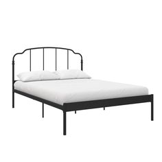 a black metal bed frame with white sheets and pillows on it, against a white background