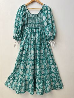 "Cotton maxi, hand block print dress, blue printed dress, boho dress, boho maxi, long maxi, smocking maxi dress, bobbin dresses, cotton dresses, vintage gown, smocked maxi, hippie dresses, gauze maxi, gift for her, gift for mom, Christmas gift, festival wear, festival gift, fast shipping  Feel beautiful and confident throughout your days wearing our block printed outfits, made with high quality soft and breathable cotton fabric.  The print on the dress is known as \"BLOCK PRINT\" which is centur Printed Outfits, Blue Printed Dress, Dresses Cotton, Smocked Dresses, Bohemian Maxi, Bohemian Maxi Dress, Vintage Gowns, Mom Christmas, Maxi Robes