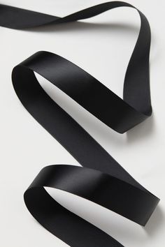 black satin ribbon on white background