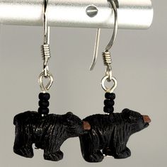 Perfect for wildlife lovers, these artisan made drop earrings feature tiny, intricately detailed, hand-painted Peruvian ceramic black bears. These animal earrings are made with hypoallergenic surgical steel. Total earring length is about 1". Unique Hand Painted Black Earrings, Hand Painted Black Earrings, Black Novelty Drop Earrings, Black Hand Painted Drop Earrings, Handmade Black Nature-inspired Jewelry, Handmade Nature-inspired Black Jewelry, Nature-inspired Black Jewelry Gift, Black Nature-inspired Jewelry, Black Novelty Jewelry For Gifts