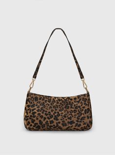 Shoulder bag  Leopard print, one removable single strap, gold-toned zip closure, one main compartment with internal pockets, flat base 60% pU 40% polyester  L 25cm x H 34.5cm x D 12cm / L 9.8" x W 13.5" x D 4.7" Leopard Purse, Everyday Purse, College Kids, Printed Purse, Mini Purse, Gift List, Printed Bags, Shoulder Purse, Leopard Print