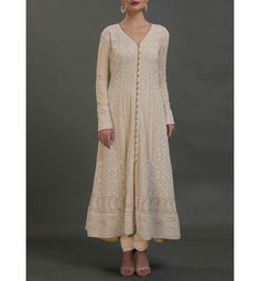 Get regal and festive with this exquisite, heavy all over hand embroidered tunic kurta dress!! When it is time to celebrate, this dress is a must!! All over delicate, exquisite Hand Embroidery called Chikankari Made to Order, tailored dress Average length: 48 in Length of product may slightly vary as per the sizes. Please note: smaller size may be slightly shorter and bigger size may be slightly longer in length Can purchase the whole set or just the Kurta Dress Available in may colors Fully cus May Colors, Extra Long Leggings, Hand Embroidered Tunics, Chikankari Suits, Long Kurta, Kurta Dress, Indian Bridal Wear, Long Leggings, Dress Suit