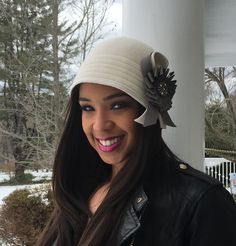 Here is a style anyone can wear! Coming in many different colors, certainly make a request for your specific needs. The hat is hand blocked on a wooden form. The ribbon detail is hand made with a jewel or button in the center that can also be made in any color. This hat makes a wonderful gifts for friends and family!The bright apple green hat was recently donated for a charity event, but another can be made. However, the center jewel will be different since that was a one of a kind! Luxury Cream Cloche Hat For Women, Fitted Hat Bands For Winter Party, Elegant Fitted Winter Hat Bands, Elegant Beige Felt Hat For Winter, Elegant Beige Winter Felt Hat, Curved Brim Hat With Ribbon For Church, Church Hat With Ribbon And Curved Brim, Classic Fitted Cream Cloche Hat, Winter Fedora Mini Hat Fitted