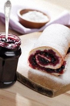 there is a roll and jam on the table