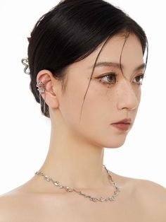 This fashion accessory features a Flower Ear Cuff with a Link Chain carefully designed to wrap around your ear. It is perfect for a night out, or to complete a timeless look. Wear it on your left or right ear, or both, for a personalized style. 
Gender: UnisexMaterial: Stainless Steel, Zinc AlloySize: 1.5 cm * 5.5 cmQuantity: 1 Piece Party Dangle Ear Cuff With Adjustable Chain, Trendy Metal Ear Cuff For Pierced Ears, Silver Ear Climbers For Party, Trendy Evening Jewelry With Adjustable Chain, Elegant Metal Ear Cuff For Party, Adjustable Metal Ear Cuff With Chain, Elegant Metal Ear Cuff For Evening, Elegant Metal Ear Cuff With Ear Wire, Party Ear Cuff With Ear Wire