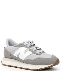 New Balance Women's 237 Retro Lifestyle Sneakers | Dillard's New Balance Running Shoes With Rubber Waffle Outsoles, Gray Nylon Sneakers For Streetwear, New Balance Sneakers With Translucent Outsole, Gray Nylon Sneakers In Athleisure Style, Gray Nylon Sneakers For Athleisure, Gray Nylon Athleisure Sneakers, Gray Low-top Nylon Sneakers, Nylon Running Shoes With Contrast Sole For Sports, New Balance Synthetic Sneakers With Textured Sole