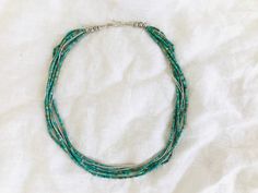 "Five gorgeous strands of hand hewn tiny natural turquoise beads and two strands of miniscule sterling silver beads from the Karen Hill Tribe of Thailand . Approx 17\" long" Choker Necklaces, Natural Turquoise, Turquoise Beads, Sterling Silver Bead, Multi Strand, Silver Beads, Cambridge, Turquoise Necklace, Choker