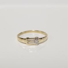 "Thanks for shopping our vintage estate store. We tend to sell well below wholesale and truly hope you enjoy all of our items. Many of the items are one of a kind, so please enjoy scrolling through the pictures and hopefully something will catch your eye. Black spots are from the camera or reflections. New made to order 14k yellow gold .01ct diamond heart Toe or midi ring. Toe Midi Ring size: please select size Band width: 3.5mm 1/4\" Weight: .65 gram Sweet ring. Mark was sized out, but tested 14k as all our gold is marked or tested. Last picture shows 14k mark before sizing ring." Belt Ring, Sweet Ring, Buckle Ring, Midi Rings, Black Spot, Diamond Heart, Belt Buckles, Rings Statement, Band Rings