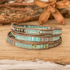 Glass Beaded Wrap Bracelet in Turquoise from Guatemala - Mayan Monolith | NOVICA