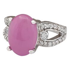 Stamped: 14K White Gold Total Ring Weight: 8.8 Grams Ring Length: N/ARing Width: N/A Gemstone Weight: Total Natural Jade Weight is 6.55 Carat (Measures: 14.00x10.10 mm) Color: Pink Diamond Weight: Total Natural Diamond Weight is 0.70 Carat Quantity: 30 Color: F-G, Clarity: VS2-SI1 Face Measures: 14.00x10.10 mm Sku: [704128W] Formal Platinum Sapphire Cabochon Ring, Oval Cabochon Sapphire Ring In Platinum, Oval Emerald Ring With Accent Stones In Platinum, Formal Oval Cabochon Diamond Ring, Art Deco Diamond Rings With Cabochon, Art Deco Diamond Cabochon Rings, Fine Jewelry Oval Cabochon Diamond Ring, Formal Ruby Ring With Diamond And Oval Cabochon Shape, Classic White Gold Sapphire Cabochon Ring