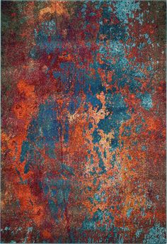 an orange and blue rug with lots of rust on it