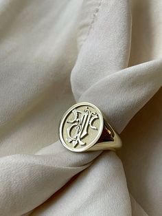 "custom gold monogram signet ring delicately engraved and personalized with your initials or any other image you want ♡ the ring has solid back. deep and detailed engraving very delicately handcrafted unisex - looks super cool on both women & men side or inside engravings cost 12 USD for both sides. please contact us if you request side engravins or simply go back to our shop and purchase the \"Side or inside engraving fee\" listing. available in 4 oval face sizes: small - 11x13 mm medium - 13x1 Signet Ring Design Ideas, Signet Ring Men Initials, Vintage Signet Ring Men, Initial Signet Ring, Signet Ring Initials, Elegant 14k Gold Engraved Initials Ring, Elegant 14k Gold Initial Ring With Engraving Option, Vintage Engraved Ring With Initials For Promise, Vintage Engraved Promise Ring With Initials