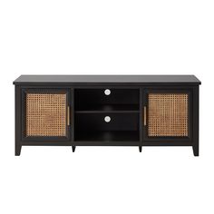 an entertainment unit with wicker doors and drawers on the bottom, in black finish