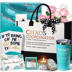 the gift bag is filled with congratulations cards, candles, and other personalized items