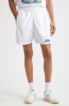 Serve your best style game on and off the court in these sporty tennis shorts equipped with side-seam pockets that hold three tennis balls each. This piece is part of a Nordstrom-exclusive capsule that pays tribute to two former tournament sites—Newport Casino and Forest Hills. Elastic waist Side-seam pockets 100% polyester Machine wash, line dry Made in Portugal Designer Clothing Summer Tennis Athletic Shorts, Summer Athletic Tennis Shorts, White Tennis Shorts Athleisure, Athletic Shorts For Tennis, Spring, White Athleisure Tennis Shorts, White Shorts For Tennis Athleisure, Athleisure Athletic Shorts For Tennis In Summer, Short Athletic Shorts For Tennis, Spring, Summer Athleisure Tennis Shorts