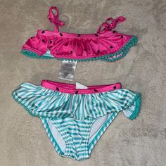 Wetsuit Watermelon Bikini Set Size: 3 Month 2 Piece Watermelon Top With Teal And White Bottoms Never Worn Smoke Free Home Make An Offer Cute Summer Tankini For Playwear, Playful Stretch Swimwear For Swimming, Playful Fitted Tankini For Poolside, Cute Summer Tankini For Casual Wear, Fitted Swimwear For Summer Playtime, Cute Pink Tankini For Poolside, Playful Green Tankini For Summer, Playful Fitted Swimwear For Playwear, Playful Stretch Tankini