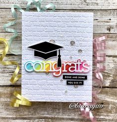 congratulations card with the words congrats and a graduation cap on top of it