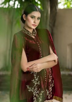 Maroon Velvet cape all handworked with tilla, dabka, and zardozi with jamawar accents. Silk inner shirt matching velvet skinny shalwar with the same work on the bottom Elegant Party Lehenga With Naqshi Details, Designer Chanderi Lehenga With Naqshi Detailing, Anarkali Style Party Lehenga With Naqshi Details, Festive Party Lehenga With Naqshi Detailing, Semi-stitched Naqshi Lehenga For Party, Party Bollywood Lehenga With Naqshi Detailing, Anarkali Lehenga With Naqshi For Party, Designer Jamawar Lehenga With Naqshi Detailing, Party Sherwani With Dabka Work In Chanderi