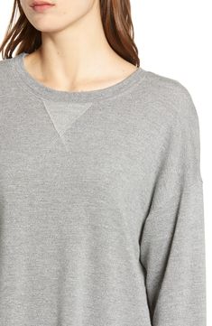 A versatile staple, this sporty pullover is made in a luxe blend of supersoft fibers and has a heathered finish that goes with everything. Crewneck Long sleeves 62% rayon, 30% cotton, 5% spandex, 3% polyester Machine wash, tumble dry Imported t.b.d. Soft-washed Crew Neck Sweater For Layering, Cotton Athleisure Tops With Soft Texture, Heather Athleisure Top For Fall, Heather Grey Athleisure Tops For Fall, Heather Grey Crew Neck Sweats For Loungewear, Cozy Fit Heather Grey Sweatshirt For Loungewear, Athletic Heather Top With Ribbed Cuffs For Fall, Sporty Heather Grey Top With Ribbed Cuffs, Cozy Fit Heather Grey Sweater For Loungewear