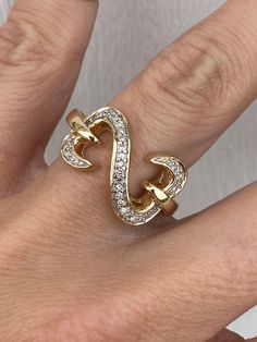 This is a well made ring.  The ring is solid so it feels very nice on the finger.  The genuine single cut diamonds measuring 1mm for .12ctw  Ring weighs 5.6g and measures 13mm at its widest point. It tapers to 2mm at the back of the shank. It is stamped 14k yellow gold. The ring is currently a size 7.75 and sizeable. We are happy to provide sizing for an additional charge. Let me know if you need a quote. Ringe Gold, Gold Band Ring, Open Heart, Gold Band, Diamond Heart, Rings Statement, Gold Bands, Band Ring, Round Diamond