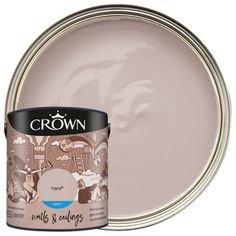 a paint can with the words crown on it and a brown tin next to it