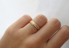 Thick and durable, yet detailed and beautiful. The light reflects beautifully on the details of this ring. Handcrafted in high-quality 14k gold filled material and made to order just for you. Stack this ring with other dainty rings for a stacked looked! Great for gifting as well. Fast Shipping: It will take 1-5 business days to send out your item Packaging: Comes in a gift box, ready for gift-giving Ring Size: Width: 4 mm, 0.15 inches Thickness: 1.3 mm, 0.05 inches Material: 14k Gold Fill Benefi Ring Simple Gold, Simple Gold Ring, Thick Gold Ring, Dainty Rings, Thick Ring, Gold Rings Simple, Floral Ring, Ring Simple, Gold Filled Ring