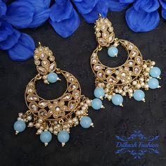 "Gorgeous, handcrafted gold & pop of color polki stud earrings! These are so classy! The earrings are 3.25 \" long & 2 \" wide. Picture is taken in natural room light. Please contact if you have any questions. Thanks!" Blue Fusion Danglers For Gift, Blue Festive Danglers, Heavy Blue Earrings For Festive Occasions, Festive Heavy Blue Earrings, Festive Blue Earrings, Blue Chandbali Chandelier Earrings For Party, Blue Kundan Chandbalis For Celebration, Blue Chandbali Danglers As Gift, Blue Chandbali Danglers For Gift