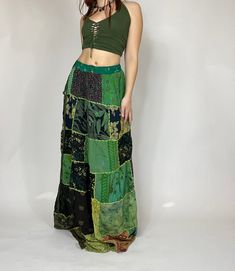 Beautiful patchwork maxi skirt with an elastic waistband and a drawstring. Every skirt will have unique patches. Waist stretches from 24' to 34' comfortably. Model is 5'2 for reference. Green Bohemian Maxi Skirt For Festival, Bohemian Green Maxi Skirt For Festivals, Bohemian Floral Patchwork Bottoms For Festival, Cotton Patchwork Flowy Maxi Skirt, Spring Green Patchwork Maxi Skirt, Green Hippie Maxi Skirt For Festival, Hippie Green Skirt For Festival, Green Flowy Patchwork Maxi Skirt, Patchwork Flowy Skirt