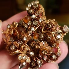 Beautiful Signed Robert Vintage Brooch And Earring Set. Amber Glass Beads And Pink, Clear Rhinestones. This Set Is Not Perfect. There Is Small Spot Of Oxidation On The Metal. It Does Not Detract From The Beauty Of The Piece. I Have Not Attempted To Clean It. Price Is Reflected. Prettiest Set Of Robert I Have Ever Seen. Ask If You Have Questions. Thank You. Party Crystal Brooch Jewelry, Crystal Brooch In Costume Jewelry Style, Crystal Brooch Costume Jewelry, Costume Jewelry Bling Brooches For Gifts, Crystal Costume Jewelry Brooch, Crystal Costume Jewelry Brooches For Gifts, Bling Costume Jewelry Brooches For Gifts, Gold Crystal Brooch Jewelry, Gold Crystal Jeweled Brooches