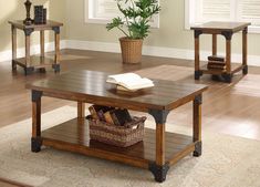 three tables with books and a basket on them in a living room area next to a potted plant