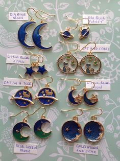 Quirky blue planet and moon themed earrings with gold backs and gold plate hooks The blue and green enamel fronts have a shimmer colouring effect and sparkle like real stars ✨  Fun designs to choose from - see the drop down menu for choice Please note planets vary in size  Super cosmic and totally unique planet earrings Bang up to date in the trend settings Check out my other cat and stars listing below 👇  for more unique finishes  https://www.etsy.com/uk/listing/845221313/cat-earrings-cat-and- Space Earrings, Galaxy Earrings, Planet Earrings, Planets And Moons, Earrings Moon, Blue Planet, Moon And Stars, Cat Earrings, Earrings Blue