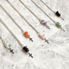 "A traditional religious symbol, my handmade Gemstone Crystal Crosses are available on a dainty necklace and matching earrings!  Made to order from a unique selection of hand picked gemstone findings and a traditional antique-style cross charm! All my necklaces are made with 2\" extender chains, making them super versitile to layer, stack or share with someone special! Choose from a beautiful selection of colours including: -Lilac Cape Amethyst: Believed to have strong healing and cleansing properties -Orange Aventurine: Considered a stone of good luck and fortune -Pink Rose Quartz: Believed to clear anger and attract love -Green Aventurine: A stone of prosperity, compassion and empathy -Deep Red Garnet: Known for it's properties of safety, strength and self-empowerment -Black Obsidian: A Cross Earring, Crucifix Necklace, Necklace Cross, Crystal Cross, Catholic Jewelry, Earring Gift, Earrings Crystal, Necklace Gemstone, Cross Earrings