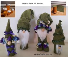 three gnomes with flowers and leaves on their heads are sitting next to each other