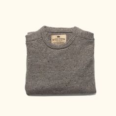 Elevate your wilderness style with our wool crewneck sweater. Channeling a cozy cabin vibe and rugged persona, it's more than an outfit – it's an escape. The wool fleck pattern, mirroring untamed landscapes, and mid-weight wool offer comfort and durability in one. Embrace adventure with every wear – your journey, your sweater. Wrap yourself in comfort, and let your attire tell your story – one of adventure, resilience, and the uncharted paths you tread. Recycled Wool Crew Neck Sweater For Fall, Fall Crew Neck Sweater In Recycled Wool, Winter Heather Crew Neck Sweater, Fair Isle Sweater For Fall Outdoor, Outdoor Fair Isle Sweater For Fall, Fall Fair Isle Sweater For Outdoor, Fall Outdoor Fair Isle Sweater, Cozy Sweater For Fall Outdoor Activities, Cozy Brown Sweater For Outdoor