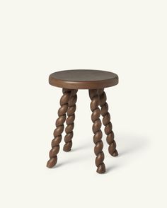 a small wooden stool with two legs made out of wood and some sort of beads