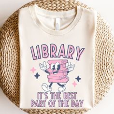 Retro Librarian Shirt perfect for Library day, because we all know its' the best part of the day! This is a unisex size T Shirt, please refer to the size chart pictured in the listing for choosing your perfect size. You will fall in love with this super soft tee with just the right amount of stretch! Its wildly comfortable and the unisex cut is flattering. It is one of our crowd favorites! It would make the perfect gift or grab it for yourself! It is sure you be your new favorite t shirt~ Our shirts are made with Direct to garment printing, not vinyl!  Which means your print will last longer and no peeling or cracking or fading! Yay!!  * Please read all details below. We want you to be completely happy with your purchase! 🌿 M A T E R I A L S Solid colors are 100% combed and ring-spun cott Library Day, Library Shirt, Book Shirt, Librarian Shirt, School Librarian, Gifts For Librarians, Reading Shirts, Teacher Tees, Book Shirts