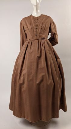 Victorian Style Dresses For Fall, Historical Victorian Dress With Buttons, Victorian Formal Dresses For Fall, Long Sleeve Brown Costume Dress, Brown Long Sleeve Costume Dress, Fall Dresses With Historical Design, Historical Prairie Dress For Daywear, Victorian Long Sleeve Dress With Buttons, Historical Long Sleeve Day Dress