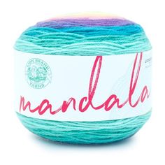 a ball of yarn with the word mandala written in red and blue on it