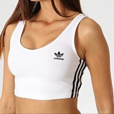 Reposhing This Item I Purchased From @Nattyt84. Loved It, But Ready To Rotate For Something New. Still Has Tags! Questions? Leave A Comment Below! Trendy White Crop Top For Sports, Basic White Sports Crop Top, Basic White Crop Top For Sports, Trendy White Crop Top For Workout, White Stretch Adidas Tops, Trendy White Top With Three Stripes, Trendy White Tops With Three Stripes, Adidas Bra, Adidas Crop Top