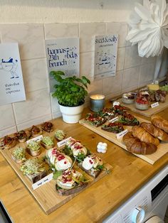 a wooden table topped with lots of food