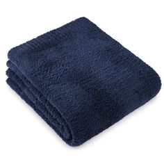 the blue towel is folded on top of each other